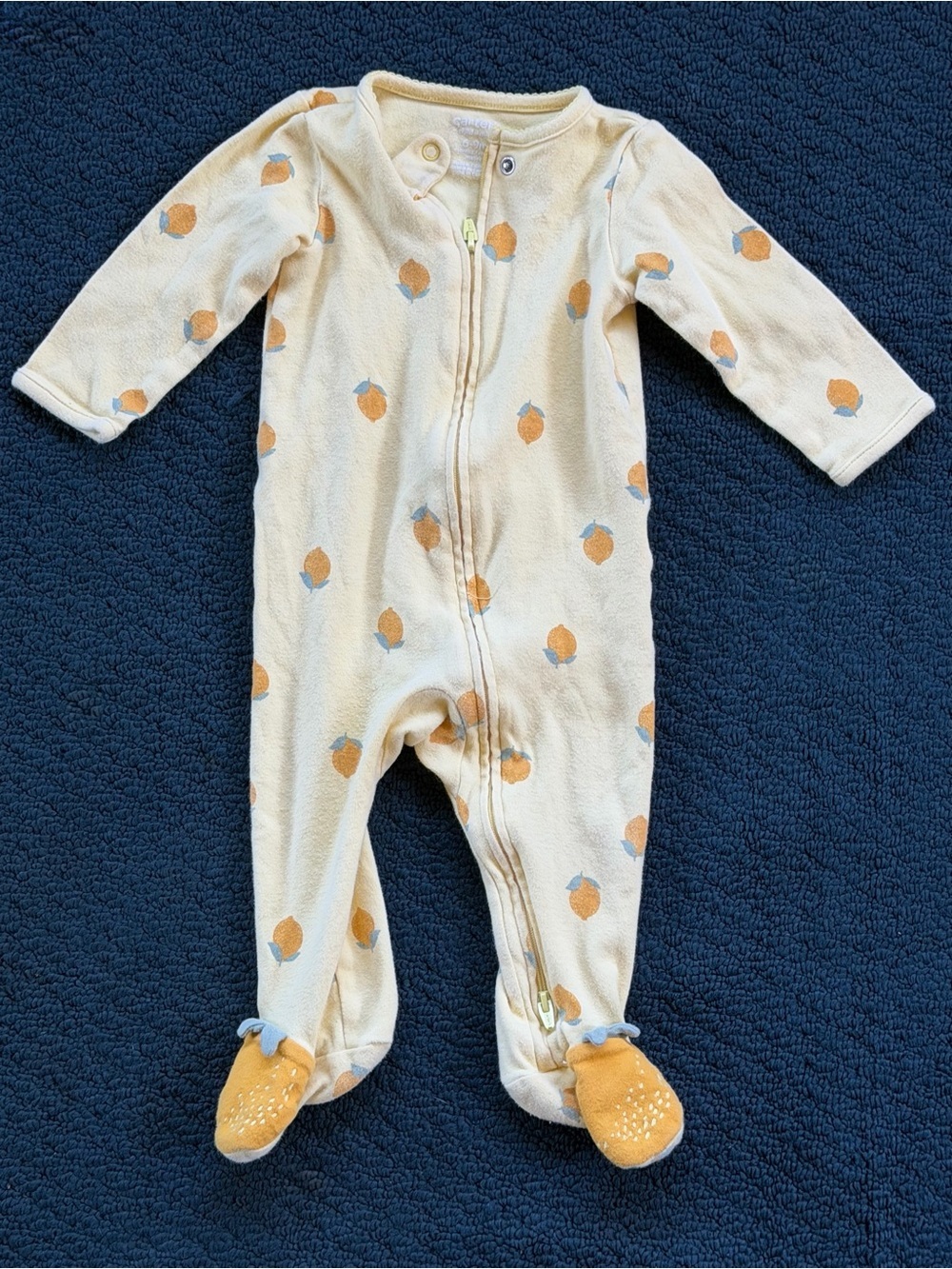 Carter's Cream One-Piece Footed Zipper Sleeper with Orange Fruit Motif